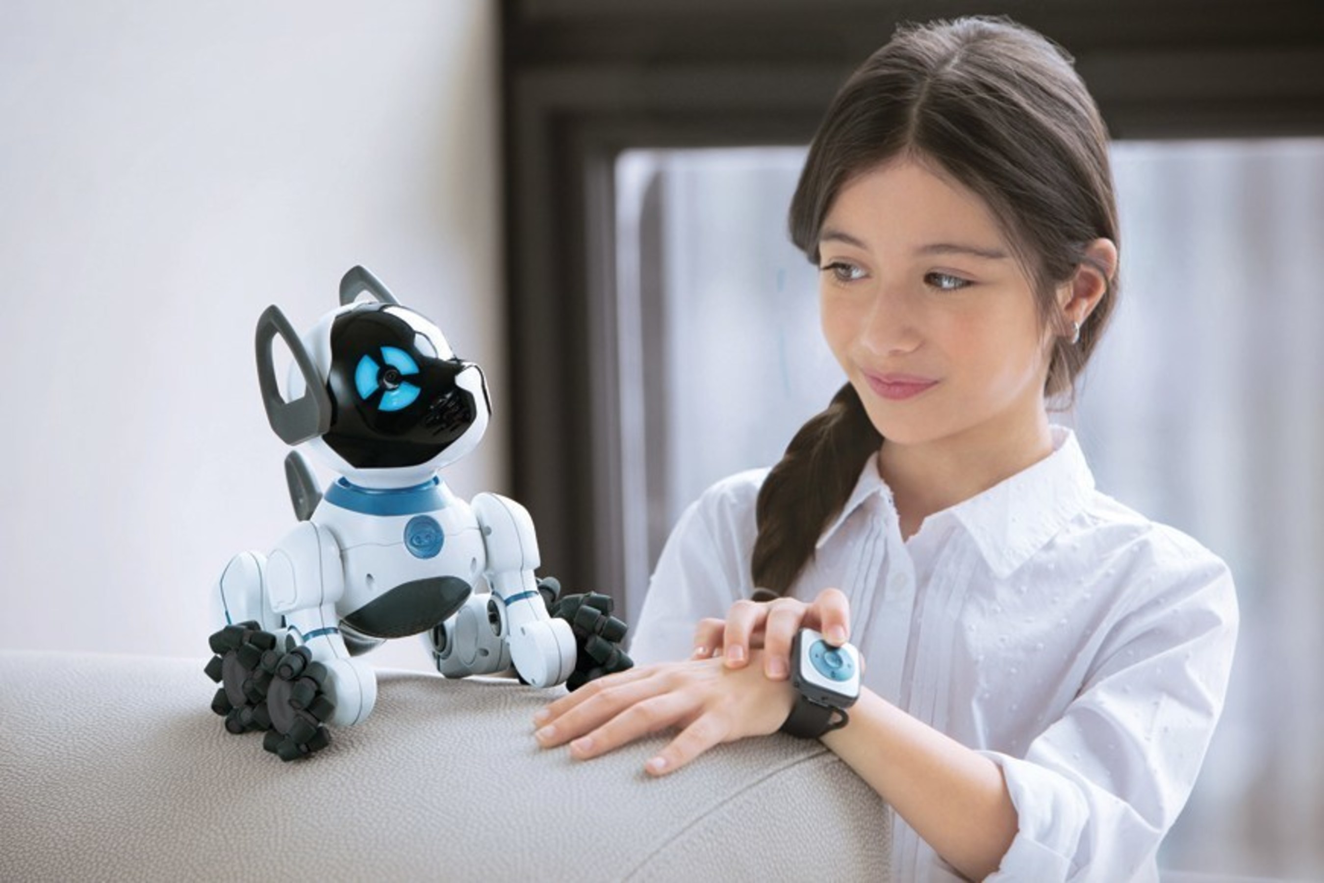 WowWee's CHiP can be controlled with the included SmartBand, Voice Recognition, and an updated, engaging app