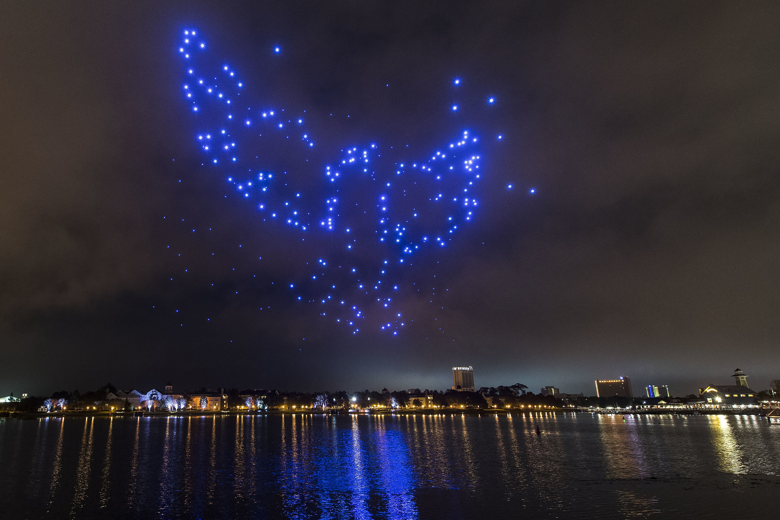 Starbright Holidays - An Intel Collaboration at Disney Spring: This holiday season, guests at Disney Springs-the shopping, dining and entertainment district of Walt Disney World Resort-will get a chance to see Disney and Intel exploring remarkable new technology as hundreds of lighted show drones take to the nighttime sky in "Starbright Holidays - An Intel Collaboration." (Matt Stroshane, photographer)