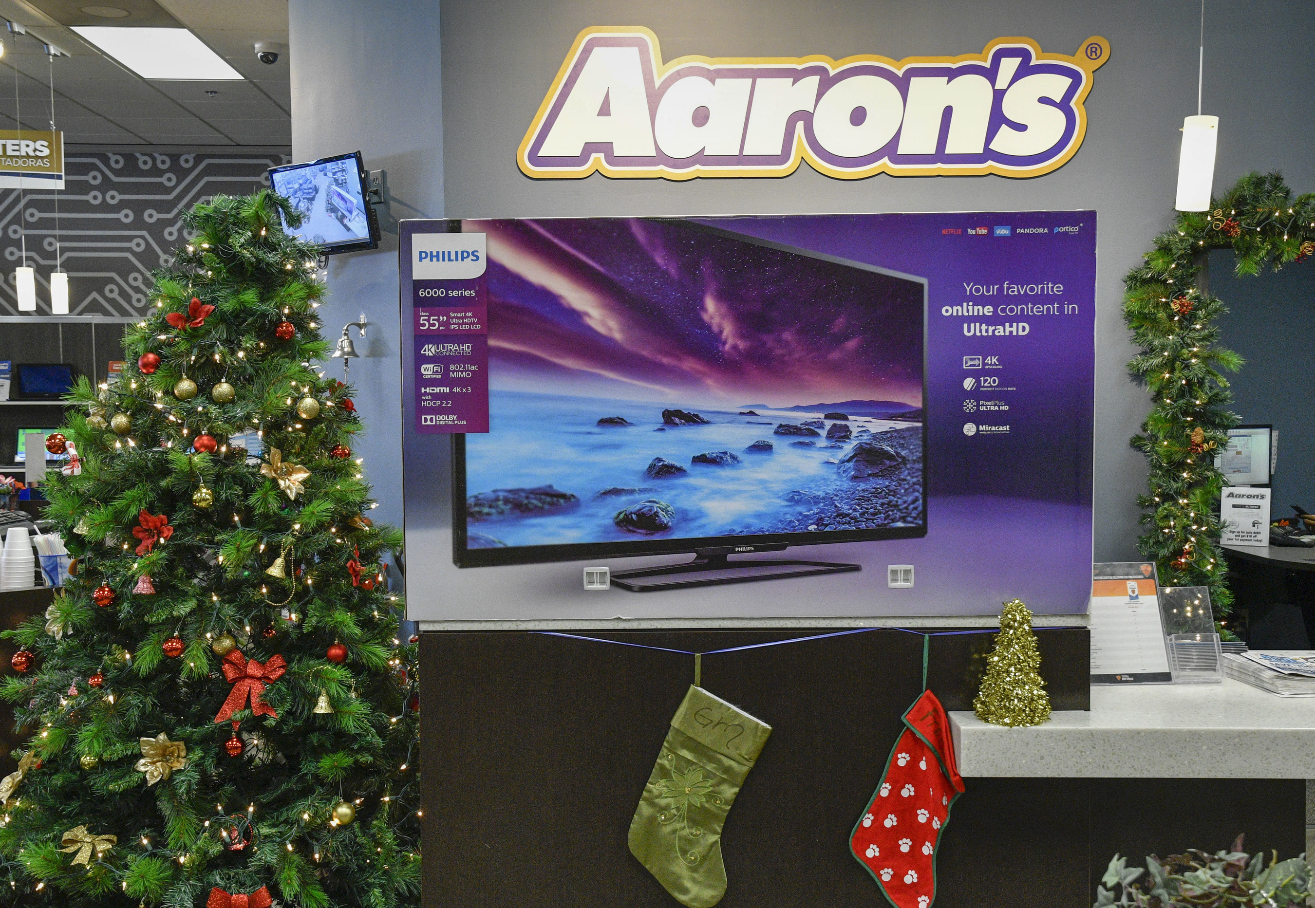 IMAGE DISTRIBUTED FOR AARON'S, INC. - Aaron's kicked off a week-long Black Friday celebration today by surprising loyal customers in Atlanta, Ga., Jacksonville, Fla., Memphis, Tenn. and Nashville, Tenn. with free 55" Phillips Smart 4K UHD LED TVs on Monday, Nov. 21, 2016. (John Amis/AP Images for Aaron's, Inc.)