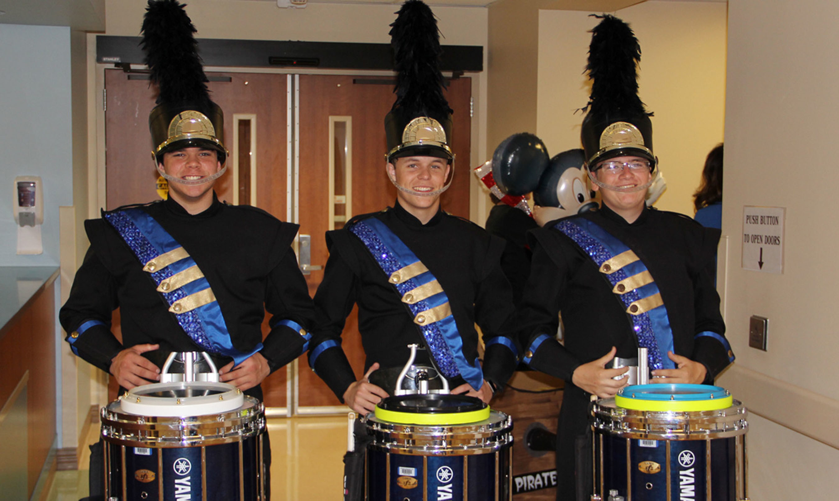 Seniors and snare drummers Matt Mohr, J.D. Dickson and Patrick Sanchez of the Cypress Ranch High School Marching Band led the parade