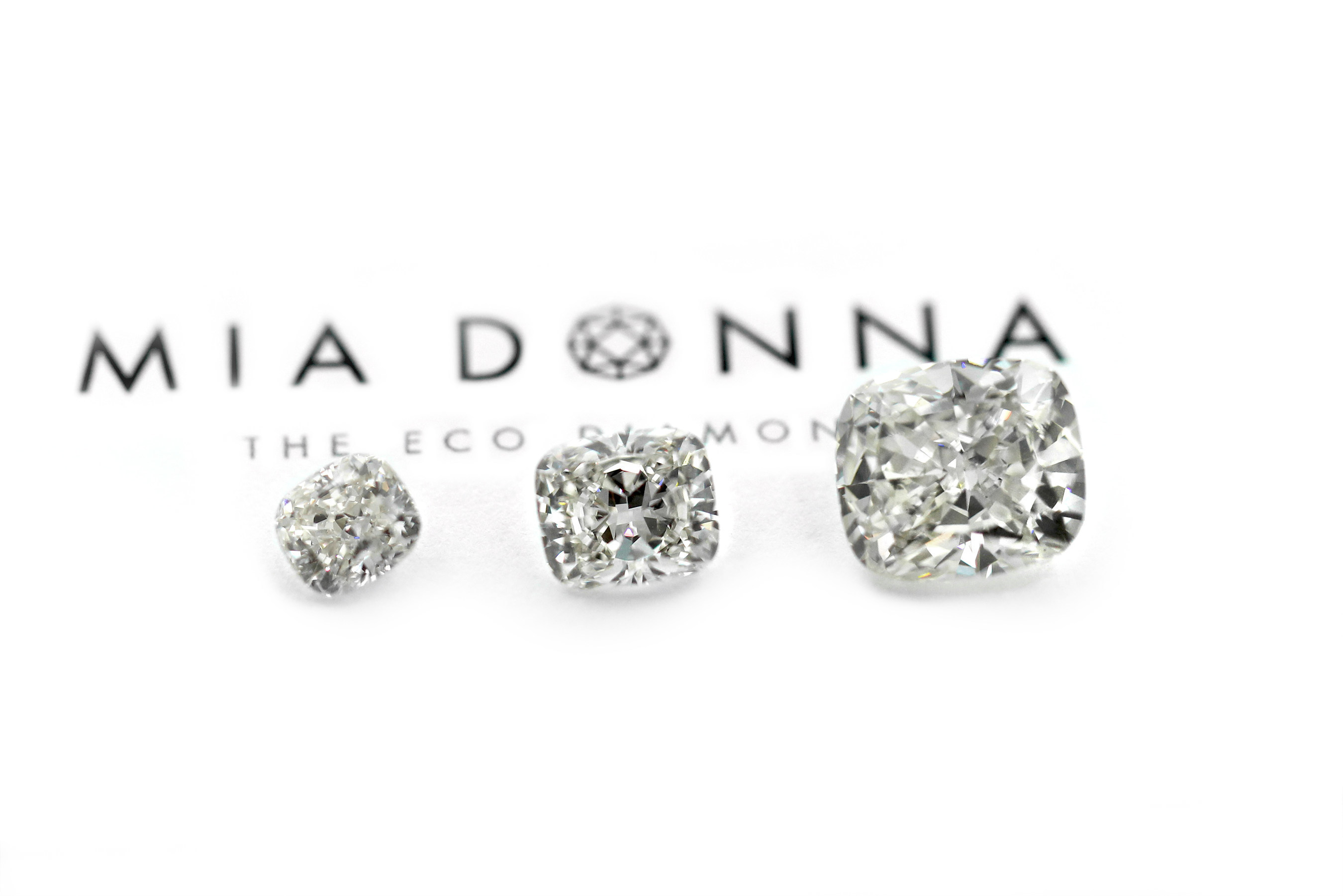 6.28 Carat MiaDonna & Company Largest Grown-in-the-USA Laboratory Diamond, next to 3 carat and 2 carat stones