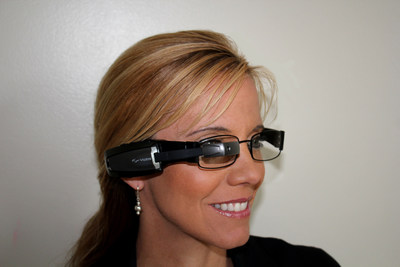 Vuzix M100 Smart Glasses attached to prescription frames