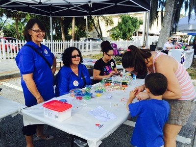 Staff members from volunteered at the Palm Harbor Chamber of Commerce 40th Annual Harbor Art and Seafood Festival.
