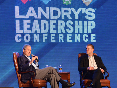 President George W. Bush speaks with Tilman J. Fertitta, President, Chairman and Sole Owner of Landry's, Inc. at the Landry's Annual Leadership Conference