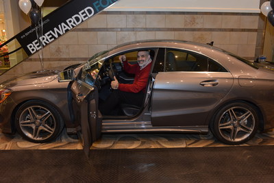 Eugene Cresta receives keys to a Mercedes-Benz CLA 250 as Simon Rewards Program Grand Prize winner.