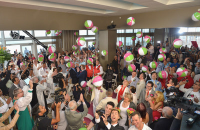 LGBT and straight couples say 'they do' at the W Fort Lauderdale in a historic group wedding ceremony hosted by the Greater Fort Lauderdale Convention & Visitors Bureau. Lance Bass and husband Michael Turchin (front) led the "Love is Love" procession on the same day as the premiere of Lance Loves Michael, the first televised gay wedding between two men. (Rodrigo Varela for Getty Images)