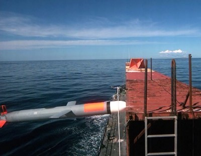 A synthetically guided Tomahawk cruise missile successfully hits a moving maritime target Jan. 27 after being launched from USS Kidd (DDG 100) near San Nicolas Island in California. The missile altered its course toward the target after receiving position updates from surveillance aircraft. (U.S. Navy photo)