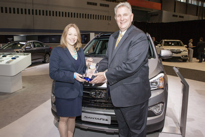 Ellen Resnick from Consumer Guide presents Consumer Guide Automotive Best Buy Awards