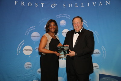 Chemetall, a business unit of Albemarle Corporation, receives prestigious Frost & Sullivan 2014 North American Metalworking Fluids New Product Innovation Award. From left to right: (Julia Murray, Vice President Global Marketing and Communications for Chemetall and Art Robbins, President - Americas and Partner, Frost & Sullivan)