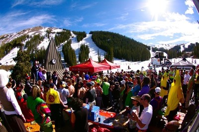 Springtime revelers celebrate the spring ski season under Colorado Ski Country's blue skies.