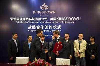 Jie Du, left front, General Manager of Roth International, and Spencer Nicholls, Director of International Sales of Kingsdown at a ceremony marking the new partnership between the two companies. Behind them are Yuande Liu, left, Vice General Manager and Director of the Board of Mayland Group; Siguo Lu, General Manager of Zhiye Real Estate Limited; Yiwen Lu, Vice General Manager of Roth International; George Mantzis, Director of Nova Shanghai; Robert Wong, Manager Director of Homeland International Group...