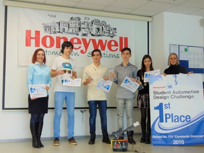 The winners of the 2014-15 Student Automotive Design Challenge sponsored by Honeywell and SAE International: (from left) Aurelia Gheorghe, teacher; Stefan Rares Rosu ; Silviu Mihai Chelariu; Tudor  Alexandru Sima; Gabriela Mara Corina Iordache; and Rodica Onofrei, teacher and program liaison. The winning team of middle school students is from Romania having successfully competed against teams from the United States, China, France, Mexico, and Switzerland. Honeywell has sponsored the motorized toy car...