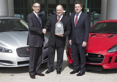 John Csernotta, Executive Director, Global Automotive, J.D. Power (L) presented Joe Eberhardt, President and CEO, Jaguar Land Rover North America (C) and Eric Johnston, Vice President Customer Service, Jaguar Land Rover North America (R) with a 2015 J.D. Power Customer Service Index award recognizing Jaguar as the highest achieving automotive luxury brand in the U.S. for customer satisfaction with retailer service for vehicle maintenance and repair on March 18, 2015.