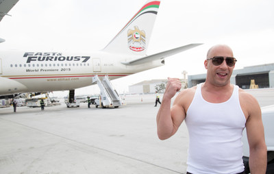 Vin Diesel welcomes Etihad Airways Flight 171 as it arrives at LAX from Abu Dhabi on the afternoon of March 18. The Fast & Furious 777 airliner's arrival kicks off the global junket and world premiere of Furious 7. (Credit: Alex J. Berliner)