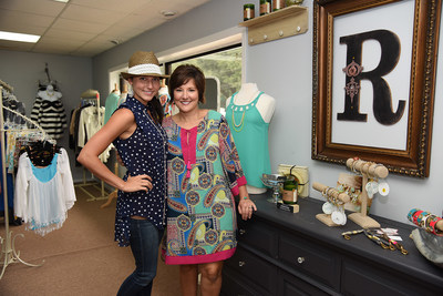 Amber Lawson (left) and Sherri Merrill are owners with Sheila Nicholson (not pictured) of Reverie Boutique in Waynesboro, Mississippi. The popular clothing store, which features upscale fashions for women and children, worked with First State Bank and the Federal Home Loan Bank of Dallas to purchase a building and make renovations. "We're wanting to redo more, but it's hard to find the time to close for the remodeling," Ms. Nicholson said. "Business is going really well."