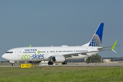 United Eco-Skies 737-900ER aircraft on runway.