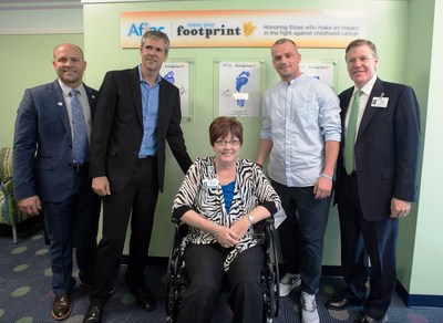 Aflac celebrated three heroes to the cause of fighting children's cancer today at Cook Children's Medical Center in Forth Worth Texas. Left to right are Eric Leger, Aflac Territory Director, Honoree Mark "Hawkeye" Louis, Honoree Teresa Clark, Honoree Scott Odom and Cook Medical Center CEO Rick Merrill