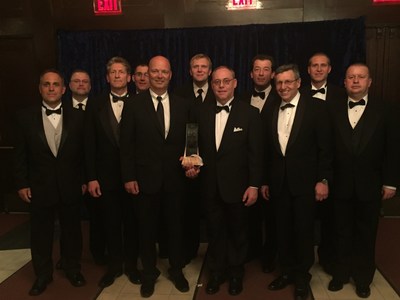 BorgWarner received a 2015 Automotive News PACE Award for its first-to-market front cross differential (FXD) technology, an innovation that provides automakers with a cost-effective and fuel-efficient alternative to all-wheel drive (AWD) systems. BorgWarner employees were joined by Dr. Burkhard Huhnke, General Manager R&D - Product Engineering, Volkswagen Group of America (left of award).