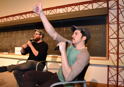 Actors Seth Rogen and Chris Mintz-Plasse provide live commentary during a special screening of their movie Superbad with this year's winners of Hilarity For Charity U - Pi Kappa Alpha fraternity and Alpha Chi Omega sorority at the University of Vermont on Saturday, April 25, 2015 in Burlington, Vt. UVM's Pi Kappa Alpha fraternity and Alpha Chi Omega sorority this year raised more than $30,000.00 for Hilarity for Charity U, benefiting the Alzheimer's Association. For more information please visit http://www.hilarityforcharity.org. (ALISON REDLICH/AP Images for Hilarity For Charity U)