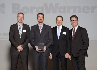 Mario Felker, Application Engineering Manager, BorgWarner Turbo Systems (left); Maic Kröll, Sales Manager, BorgWarner Turbo Systems (center left) and Dr. Martin Fischer, Vice President and General Manager Europe, BorgWarner Turbo Systems (center right) receive the Volvo Cars of Excellence Award from Lars Wrebo, Senior Vice President Purchasing & Manufacturing, Volvo Cars (right) during a ceremony held recently at Volvo Cars in Gothenburg (Sweden). (Photo courtesy of: VOLVO CAR CORPORATION)