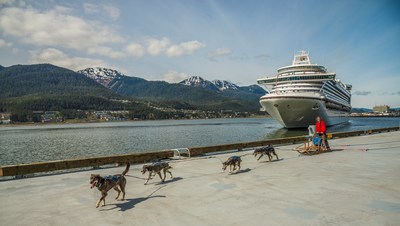 A dog sled team led by Maliko Ubl from the TEMSCO Helicopters Mendenhall Glacier Dog Sledding Tours and Alaska Icefield Expeditions welcomed Ruby Princess to the port of Juneau during her maiden voyage in Southeast Alaska.