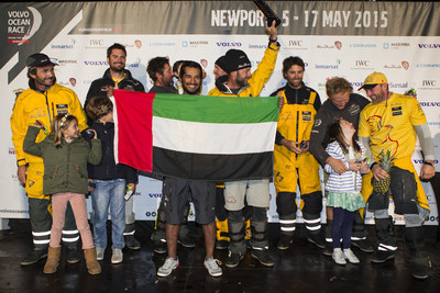 Ian Walker and the Abu Dhabi Ocean Racing crew celebrate after securing second place on Leg 6, giving them a 6-point lead in the overall standings with three Legs remaining.