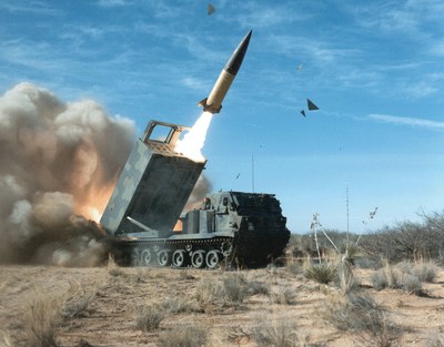 A Lockheed Martin M270A1 launcher fires an ATACMS long-range missile during a 2009 test.