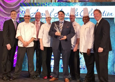 Aramark accepts Nation's Restaurant News' MenuMasters award, in the category of Best Limited-Time Offer, for its Sports and Entertainment division's "Stadium Sandwich" series, in Chicago on May 16, 2015.