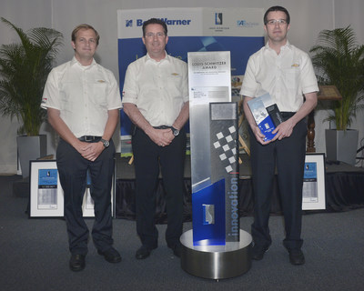 Standing with the new Louis Schwitzer Award trophy (left to right) were award winners Charles Ping, Project Manager, Race Operations, Pratt & Miller Engineering; Chris Berube, Program Manager, Chevrolet Racing; and Arron Melvin, Chief Aerodynamicist, Pratt & Miller Engineering. (Not shown: Mark Kent, Director of Motorsports Competition, Chevrolet Racing.) Symbolizing the spirit of innovation, the new Louis Schwitzer Award trophy debuted at the event, sporting the names of all award winners since 1967.