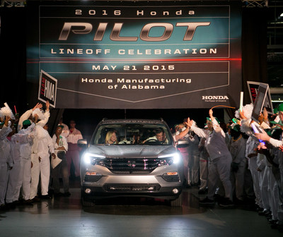 Associates at Honda Manufacturing of Alabama celebrate the production of the all-new 2016 Honda Pilot Thursday at the plant in Lincoln, Alabama.