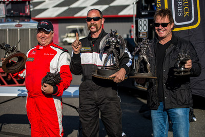 Mike Morgan (center) finished first in the inaugural Meritor ChampTruck World Series(R) at New Jersey Motorsports Park in Millville, New Jersey April 26. Ricky Proffitt Rude (left) came in second and Mike Ryan was third-place finisher.