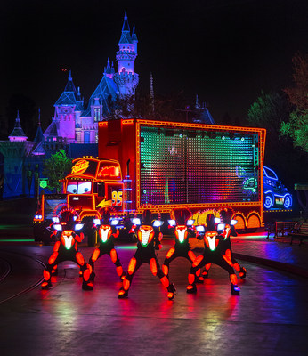 MACK AND THE CARS CREW 'PAINT THE NIGHT' (ANAHEIM, Calif.)- Mack from the Disney●Pixar 'Cars' films appears with parade performers in synchronized, LED costumes in this all-new after-dark spectacular at Disneyland park inspired by the iconic 'Main Street Electrical Parade.' 'Paint the Night' is full of vibrant color and more than 1.5 million, brilliant LED lights and features special effects, unforgettable music, and energetic performances that bring beloved Disney and Disney●Pixar stories to life. (Paul Hiffmeyer/Disneyland)