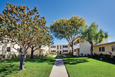 Aimco preserved the mid-century modern architecture of Lincoln Place and the community's many green spaces featuring native trees.