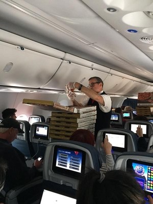 Passengers on a Delta flight diverted to Knoxville received Marco's Pizza from the flight crew (Photo Courtesy of Delta Airlines).