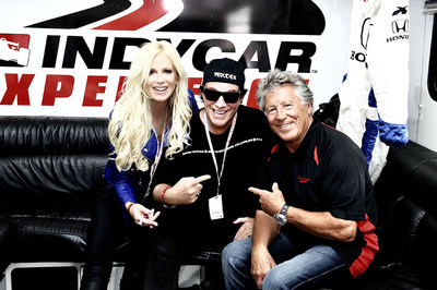 Journey's Neal Schon rides with Mario Andretti, a birthday gift from wife Michaele Schon.