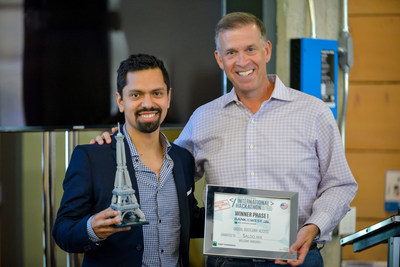 Andy Harmening, Senior Executive Vice President and head of the Regional Banking Group at Bank of the West, presenting Saldo.mx's Marco Montes with BNP Paribas' International Hackathon presented by Bank of the West Award.