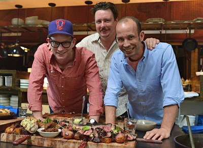 The Lee Bros. with Chef Tim Byres (center) of Smoke in Dallas. Photo Credit: Cooper Neill/Getty Images