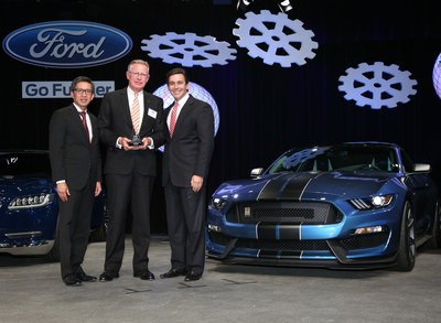 Dr. Karl Krause, CEO Kiekert (middle) with Mark Fields, Ford CEO (on the right) and Hau Thai-Tang, Ford Group Vice President Global Purchasing (on the left)