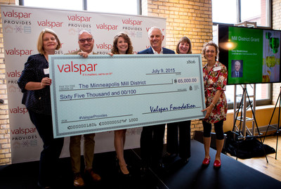 To commemorate the return of Valspar Corporation's headquarters to the historic Mill District area in Minneapolis, the Valspar Foundation announced $65,000 in grants to five non-profit organizations. Pictured with Valspar Chairman and CEO Gary Hendrickson (third from right) are (l-r) Laura Roller of Mill City Museum, Jeff Rathermel of Minnesota Center for Book Arts, Emily Dehn of The Guthrie Theater, Gary Hendrickson, Valspar, Jennifer Halcrow of MacPhail Center for Music, and Brenda Langton, founder of the Mill City Farmers Market. "As Minneapolis is Valspar's global headquarters community, we are pleased to support the Mill District neighborhood," said Gary Hendrickson.