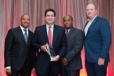 CARLOS LIRIANO OF LOST PINES TOYOTA RECEIVES SECOND ANNUAL INNOVATION AWARD FROM NAMAD AND COX AUTOMOTIVE. Pictured L to R: Damon Lester, President, NAMAD; Carlos Liriano, Dealer Principal, Lost Pines Toyota; Rock Anderson, Chief People Officer, Cox Automotive; Kevin Filan, VP, Customer & Industry Marketing, Cox Automotive