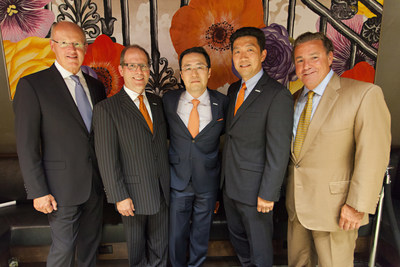 Mark Laport, CEO of Concord Hospitality, Mike Murphy, SVP of Upscale Brands at Choice Hotels, Philip and Robert Chun, We Care Trading LLC, and Steve Joyce, President and CEO of Choice Hotels at the grand opening of the Cambria hotel & suites New York-Chelsea