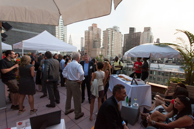 Guests enjoy city views at the grand opening of the Cambria hotel & suites New York-Chelsea