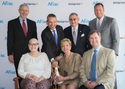 Aflac honored two local heroes who have made an impact in the fight against childhood cancer today at Palmetto Health Children's Hospital in Columbia, South Carolina. Back row, from left to right -- Dr. Ronnie Neuberg, Aflac Medical Director, Children's Center for Cancer and Blood Disorders at Palmetto Health Children's Hospital; Daniel Lebish, Executive Vice President; Chief Operating Officer of Aflac Group Insurance; Samuel Tenenbaum, President of Palmetto Health Foundation; Todd Ellis...