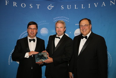 SGI-DNA's President Nathan Wood (left) and Vice President of Engineering and Instrumentation Laurence Warden (middle) Accept the 2015 North American Synthetic Biology New Product Innovation Award for the BioXp(TM) 3200 System from Frost & Sullivan's President, Americas & Partner Art Robbins (right).