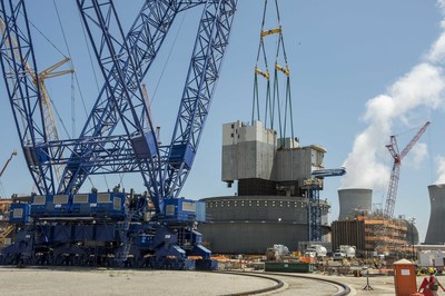 The 2.28 million-pound CA01 module is lifted into place at Plant Vogtle Unit 3 near Waynesboro, Georgia on Saturday, August 8. The module was lifted by a 560-foot tall heavy lift derrick, one of the largest cranes in the world.