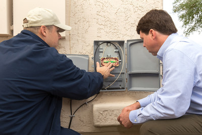A Cox Communications Field Services Technician readies a home for gigabit Internet service, now available in parts of San Diego. Cox has been deploying gigabit speeds to businesses for more than a decade, and has committed to offering residential gigabit speeds in all of its markets by the end of 2016.