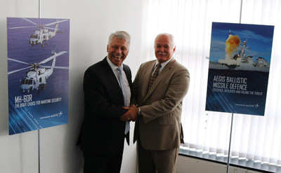 Peder Pedersen (left), chief executive officer of Weibel Scientific A/S, and Brad Hicks (right), vice president of Integrated Warfare Systems and Sensors at Lockheed Martin, participated in a signing ceremony marking the launch of a new partnership between Lockheed Martin and Weibel Scientific to extend ballistic missile defense capabilities.