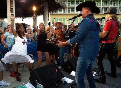 John Rich (L) and Big Kenny of Big & Rich perform exclusive acoustic concert at Holiday Inn Resort Pensacola Beach on August 23, 2015 in Pensacola, Florida. (Photo by Rick Diamond/Getty Images for Holiday Inn Resort)