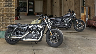 (Left to right) Harley-Davidson's new Forty-Eight(R) and Iron 883(TM) models assert Dark Custom leadership with motorcycles inspired by the rebellious spirit of the past updated with modern design and new suspensions that put a little extra smooth in the Harley-Davidson soul.