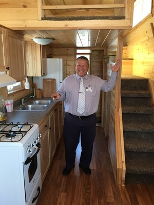 Scott Sirois, Soboba Casino's General Manager is pictured here inside and with the key to the Tiny Home that will be given away this September in the casino's promotion "Tiny Home, Giant Free Play." The grand prize is a tiny home built by Rich's Portable Cabins and that will be featured in an upcoming episode of FYI channel's program "Tiny House Hunters."